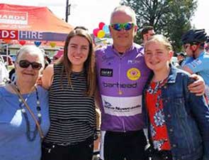 Damian's mum and daughters support him at the end of the most recent 1000 Ks 4 Kids event