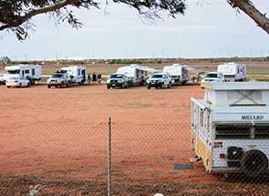 Caravans lined up at the Port Hedland RV overflow campsite