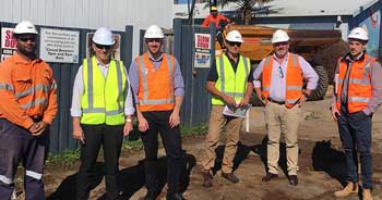 Kiama Council's manager of commercial services Tim McLeod (second from left) with contractors from APP and BMD at the Surf Beach site