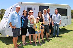 Pictured at the official opening are, from left, Cr OPray, Ms McSorley, Ms Cooper with Daisy the dog, Isabella and Sarah Cooper, Mr Cooper, Mr McSorley, council manager (Commercial) Geoff Close with the Coopers caravan.