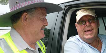 Caravanner Tony Norman chats with senior transport inspector Ian Bonnor