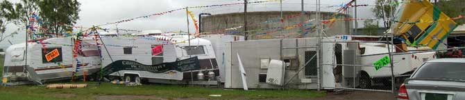 The scene after a mini-tornado ripped into the Caravan Mart sales yard at Townsville